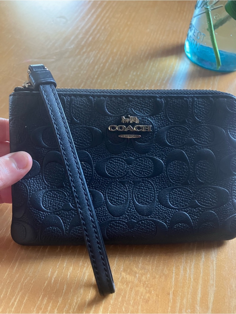 Coach Black Embossed Signature Wristlet with Gold Logo